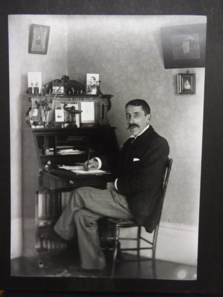 Dr Baker at his writing desk