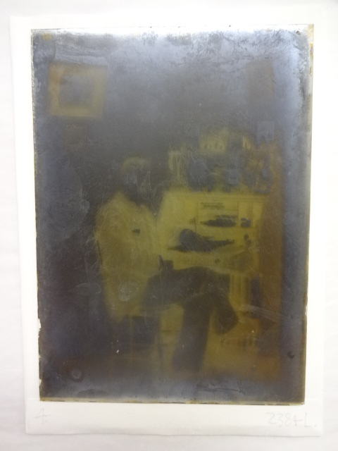 Dr Baker at his writing desk