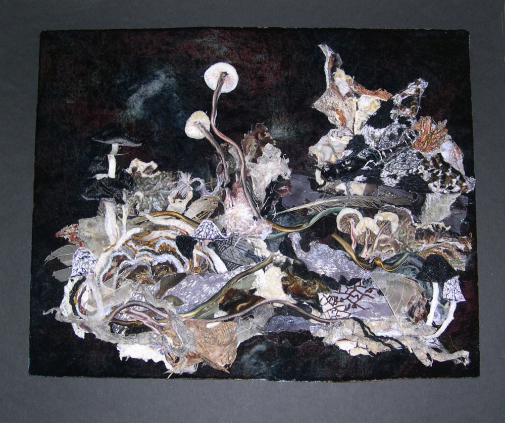 Collage artwork involving embroidery depicting woodland scene